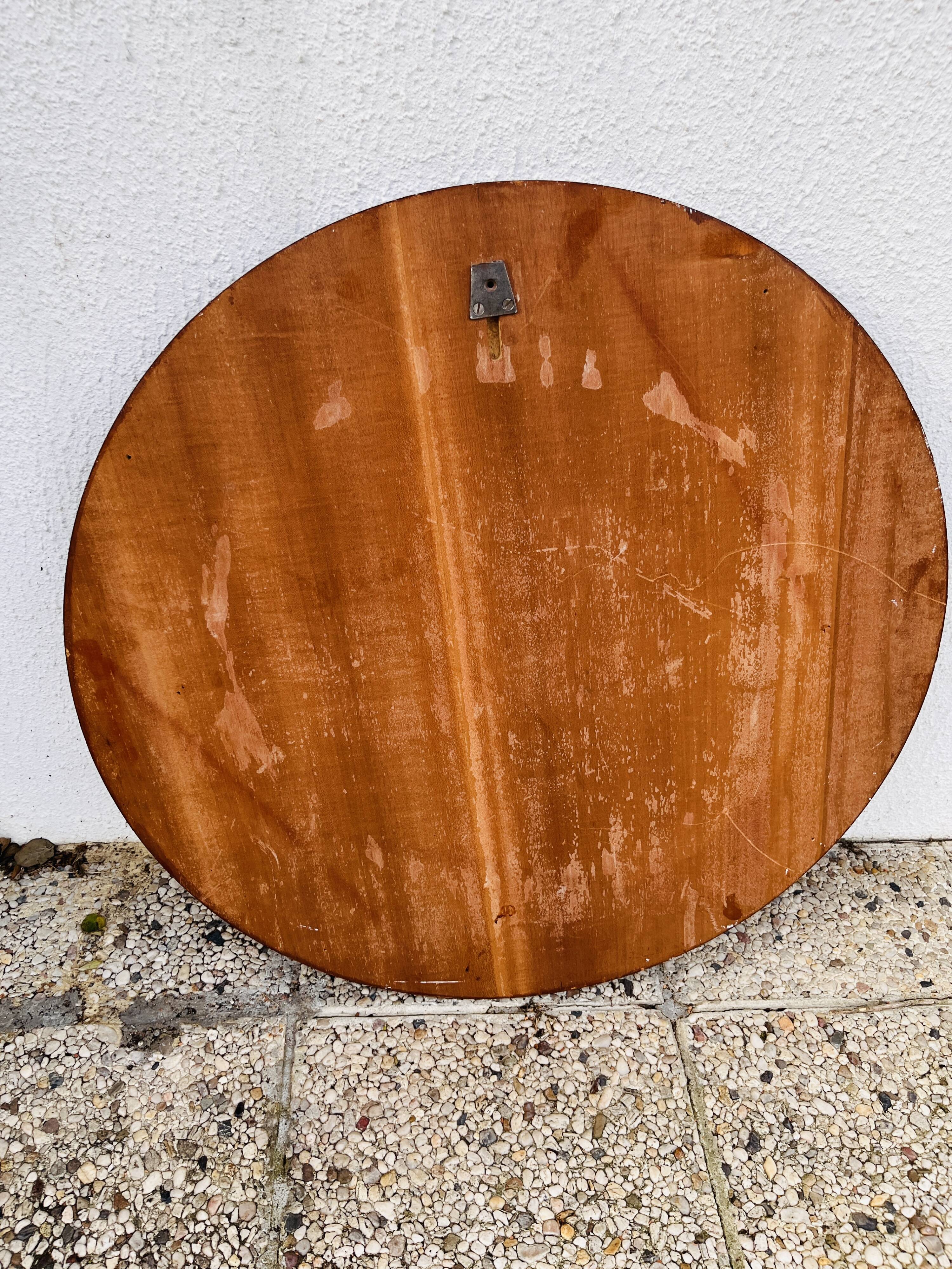 Round mirror in rosewood