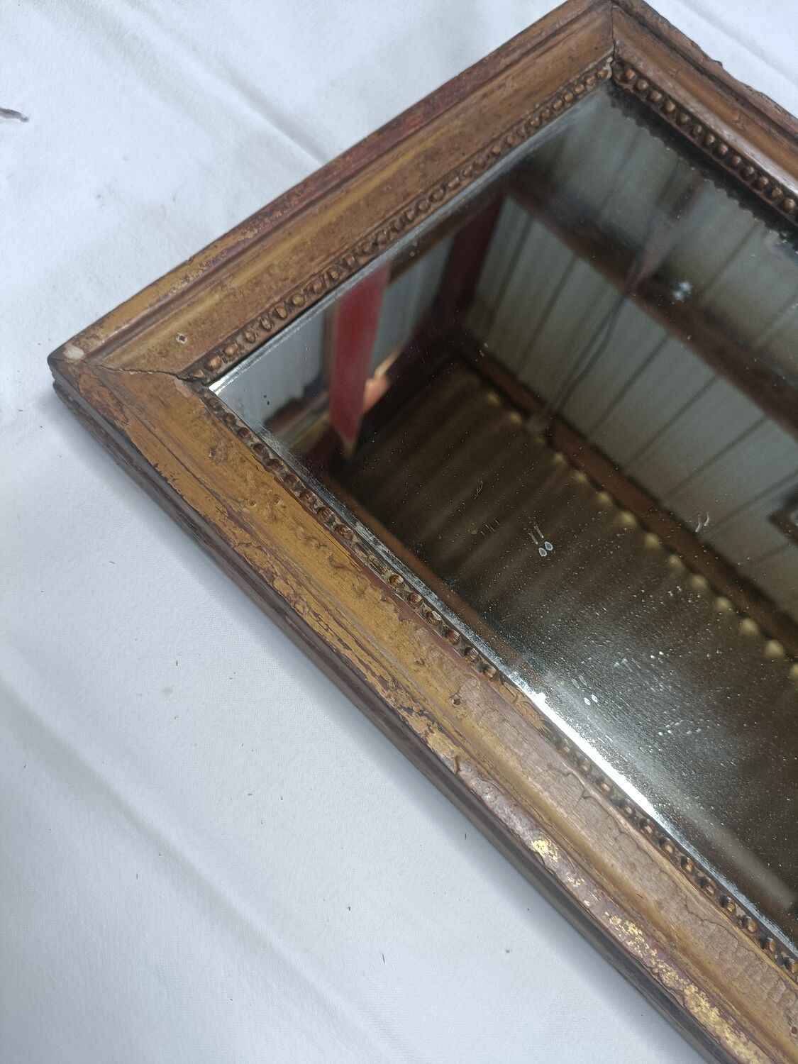 Small mirror in carved stucco wood, nineteenth, original ice