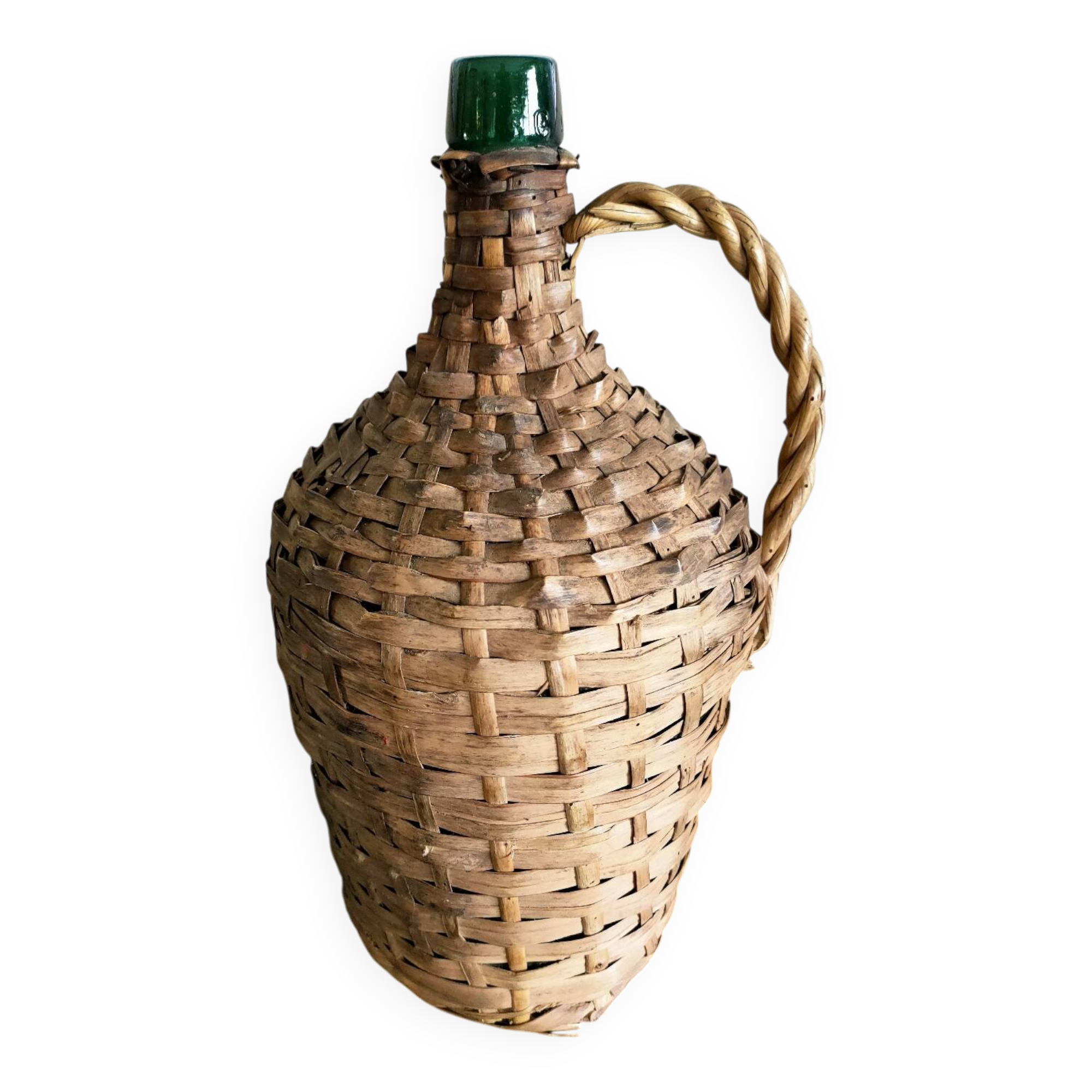 Antique demijohn made of glass and woven wicker