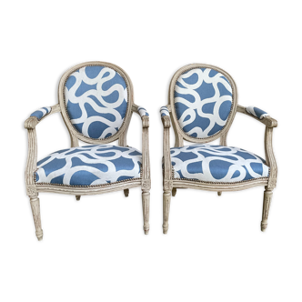 Pair of restored Louis XVI convertible armchairs