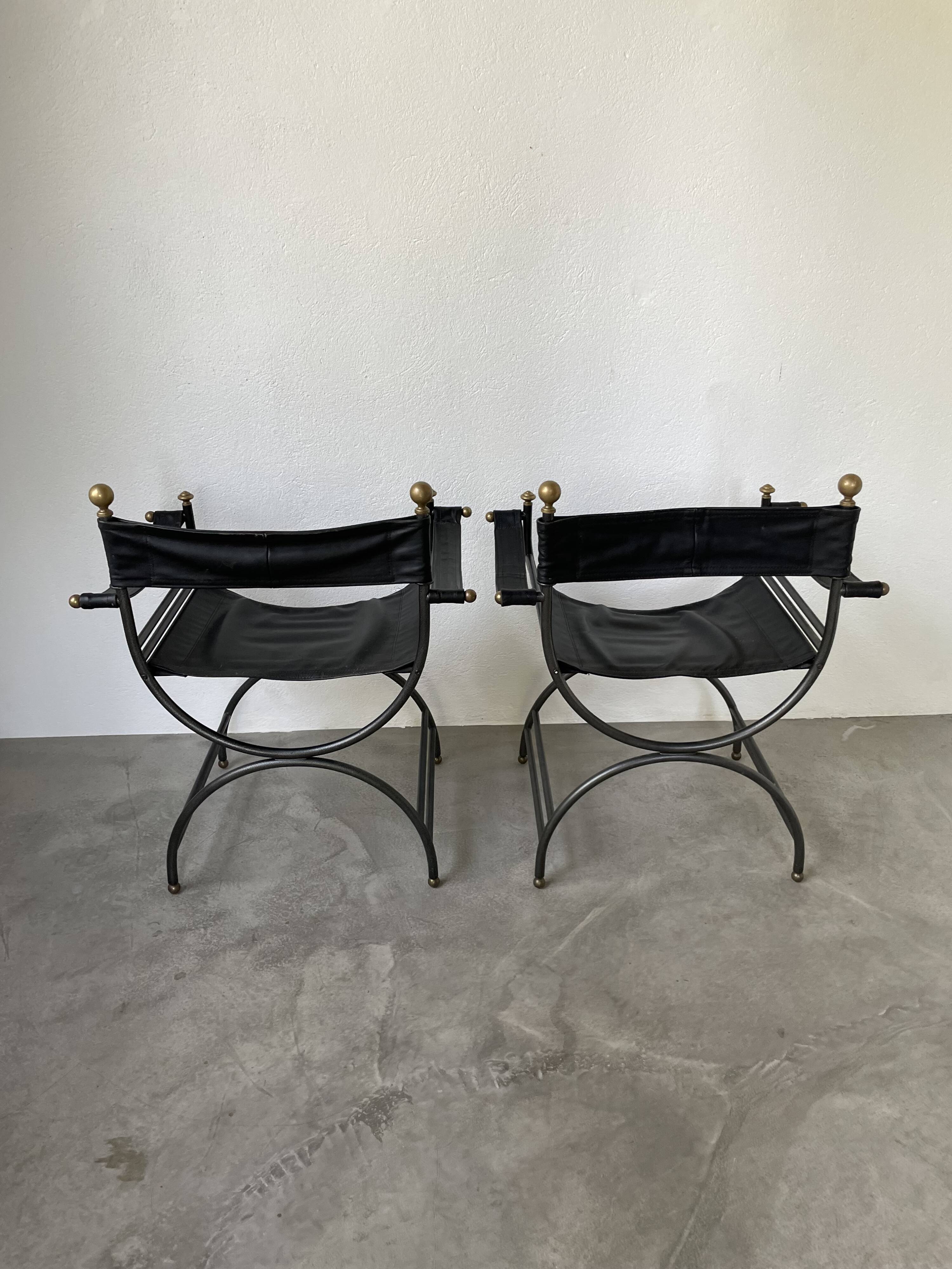 Pair of leather “curule” emperor armchairs