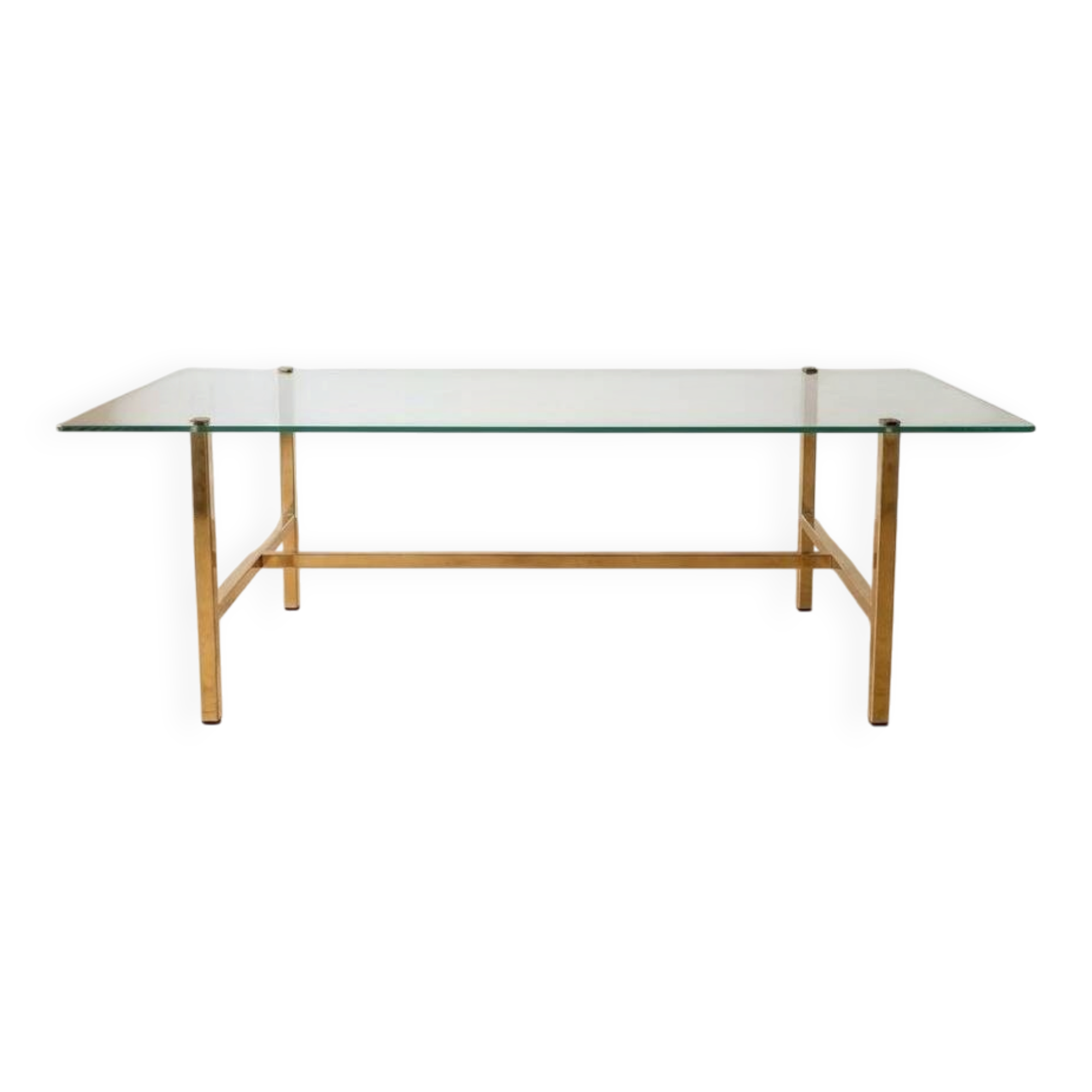 Vintage coffee table with glass and gold metal.