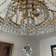 Brass hot air balloon chandelier with cascade of tassels