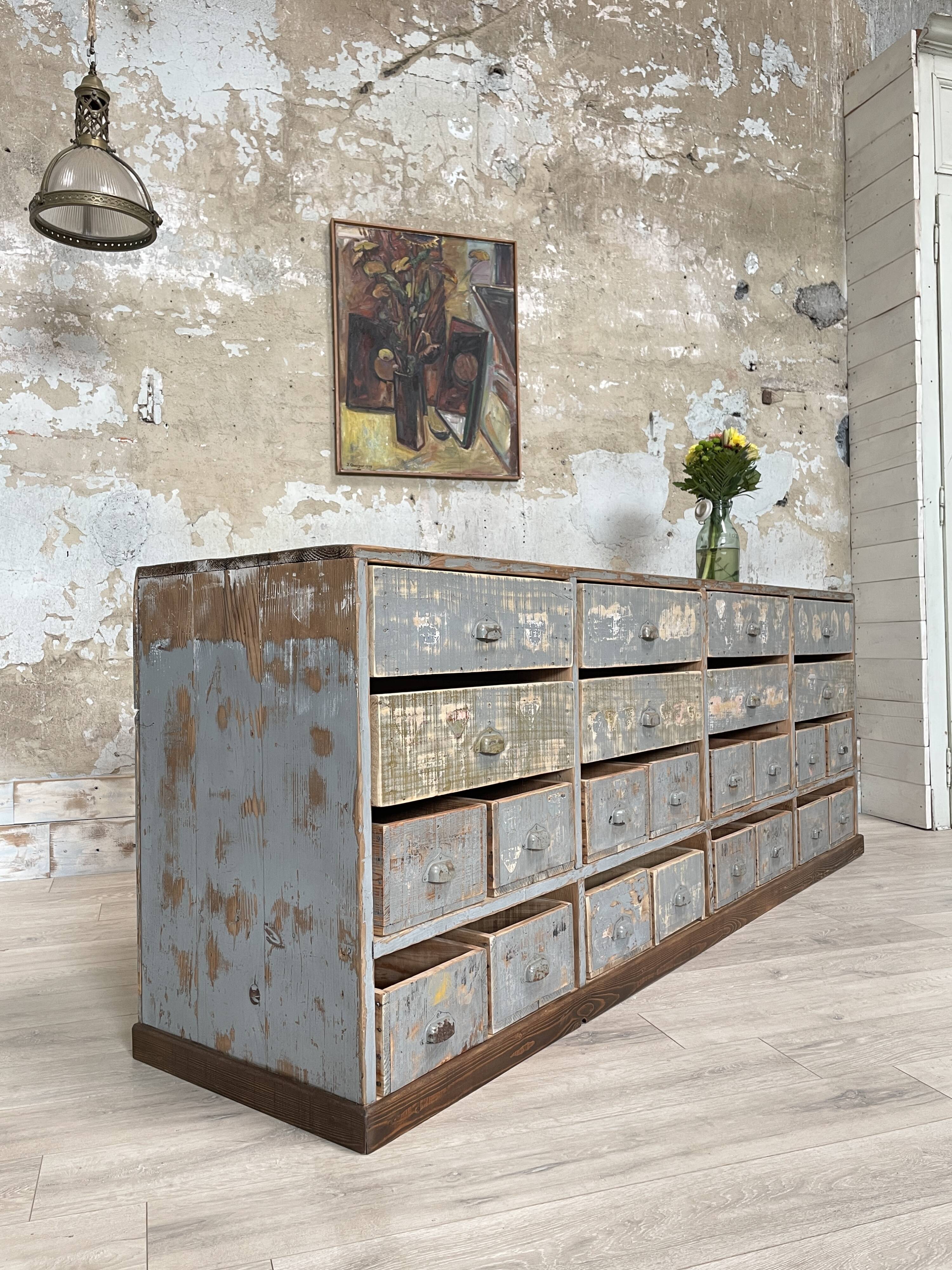 Artisanal workshop bank in patinated wood, circa 1950.