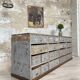 Artisanal workshop bank in patinated wood, circa 1950.