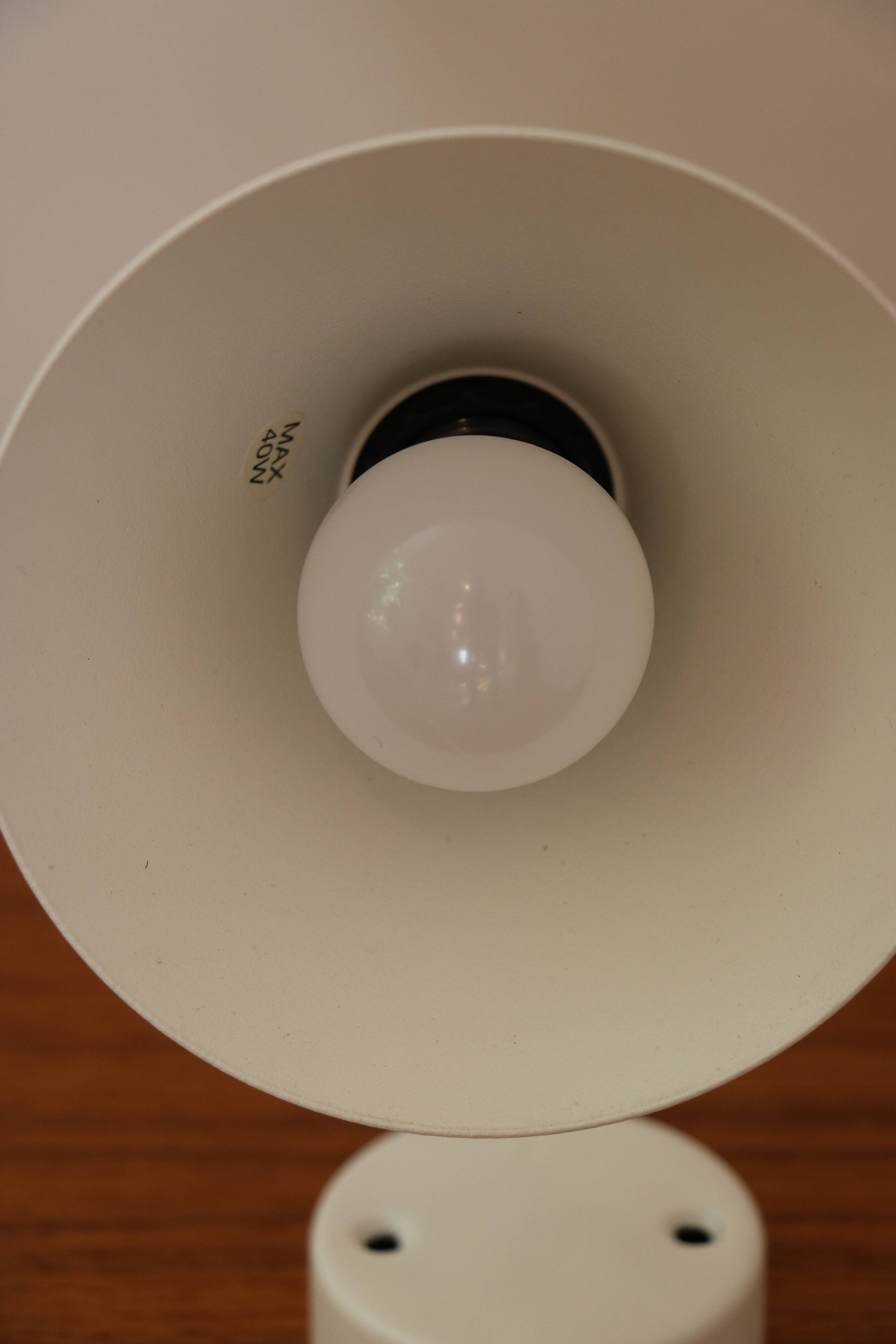 Pair of Scandinavian wall lights in white metal and gold metal