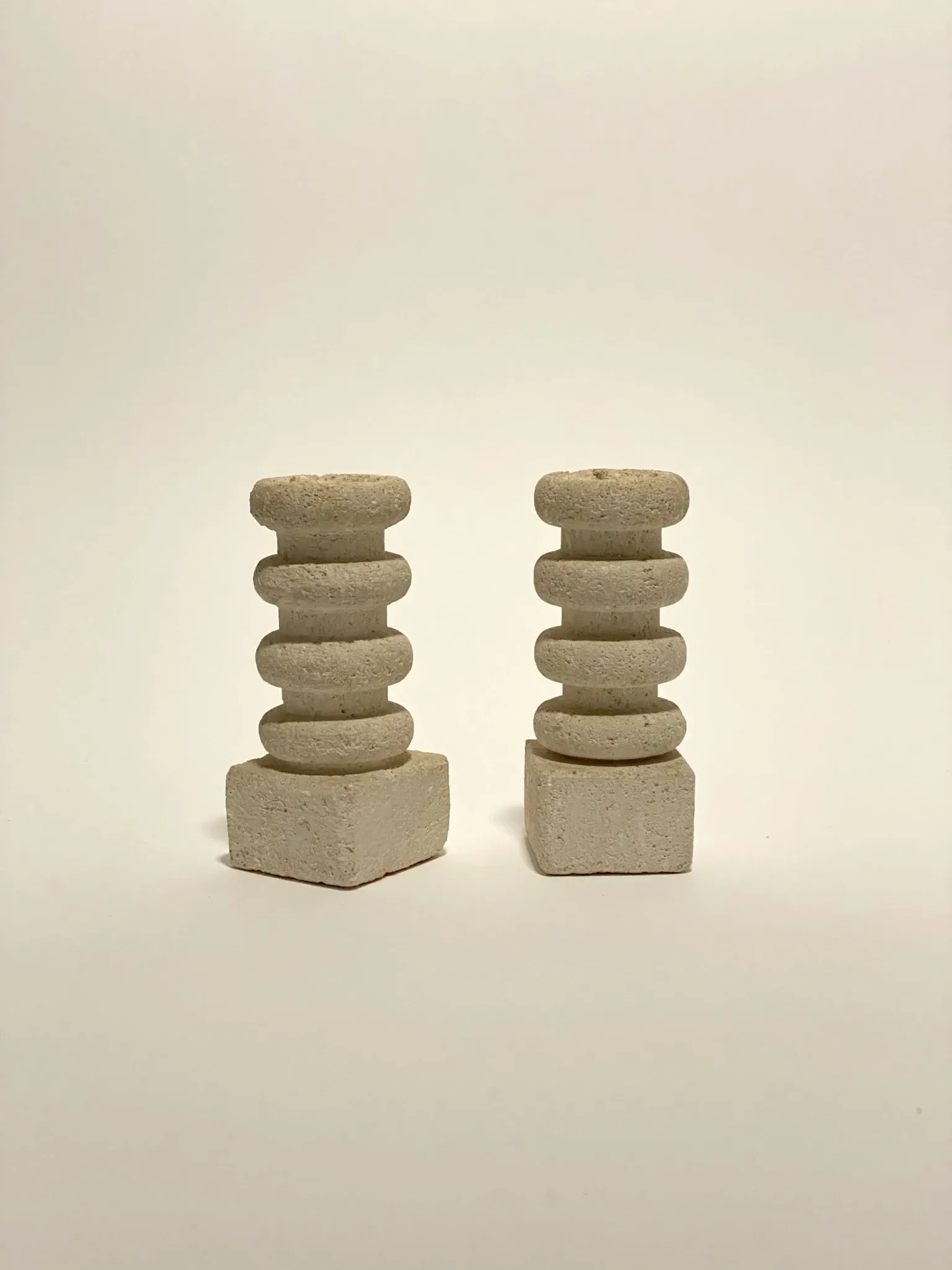 Pair of stone candle holders