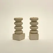 Pair of stone candle holders