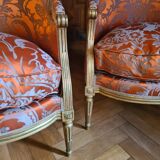 Pair of Louis XVI period shepherdesses, in gilded wood