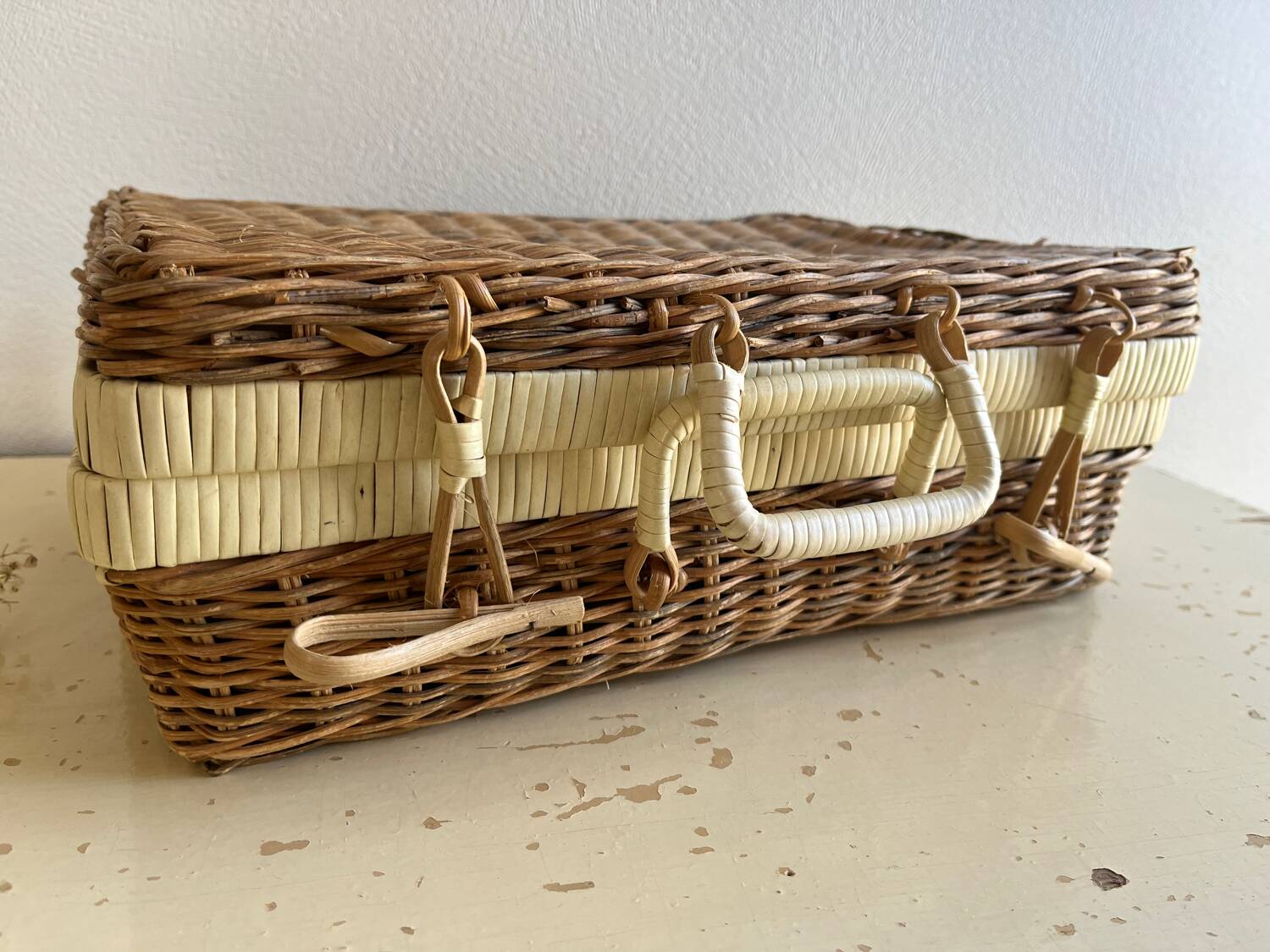Vintage woven wicker suitcase