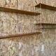 Vintage modular wall shelf with 4 supports and 5 levels.