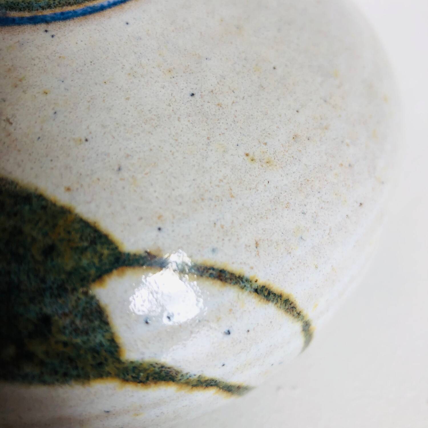 Ceramic bud vase with floral decoration