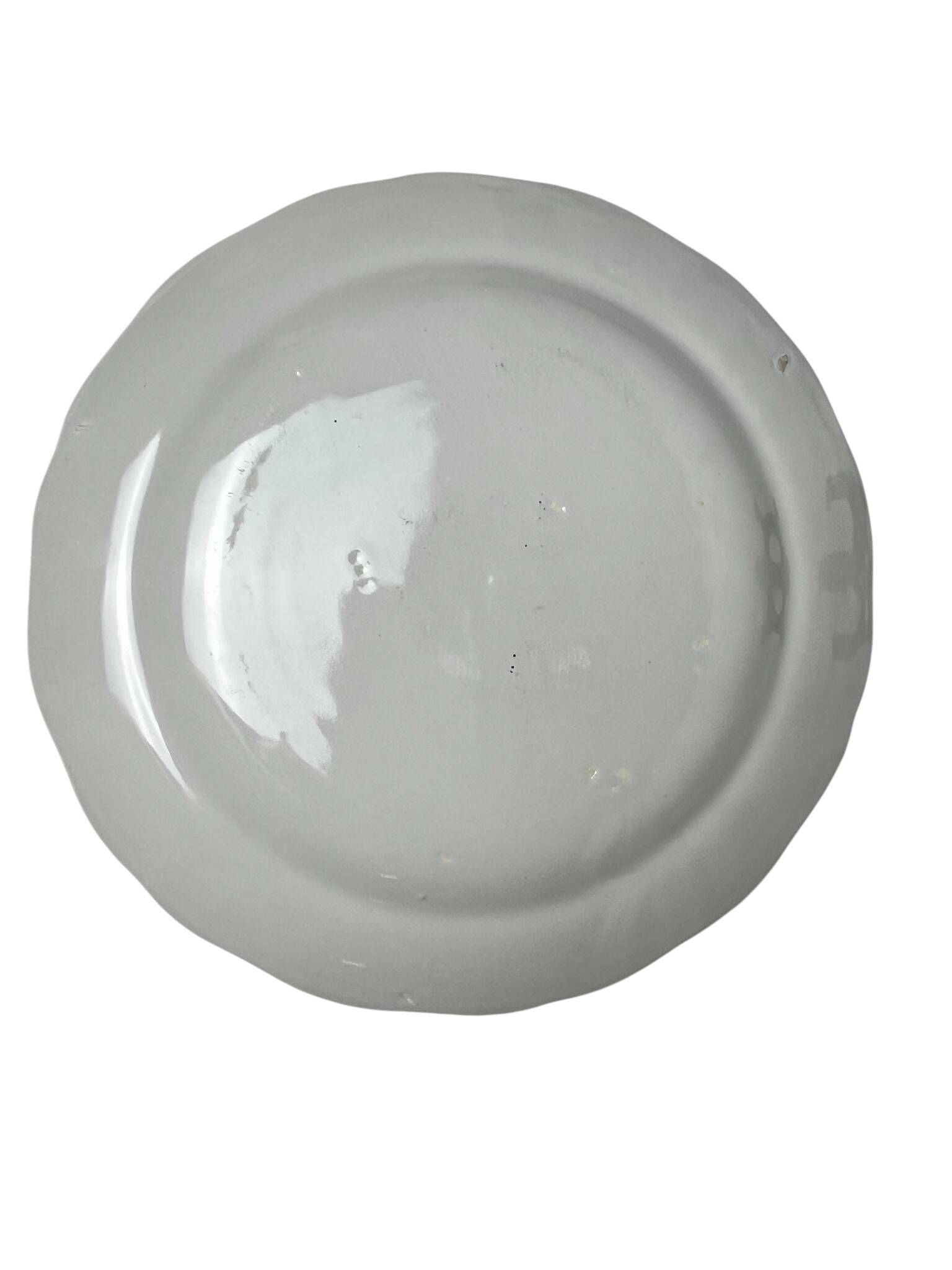 Assiette en faïence Argonne décor guirlandes, fin XIXème