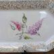 Limoges enamel porcelain cake dish LF with lilac flower decoration.