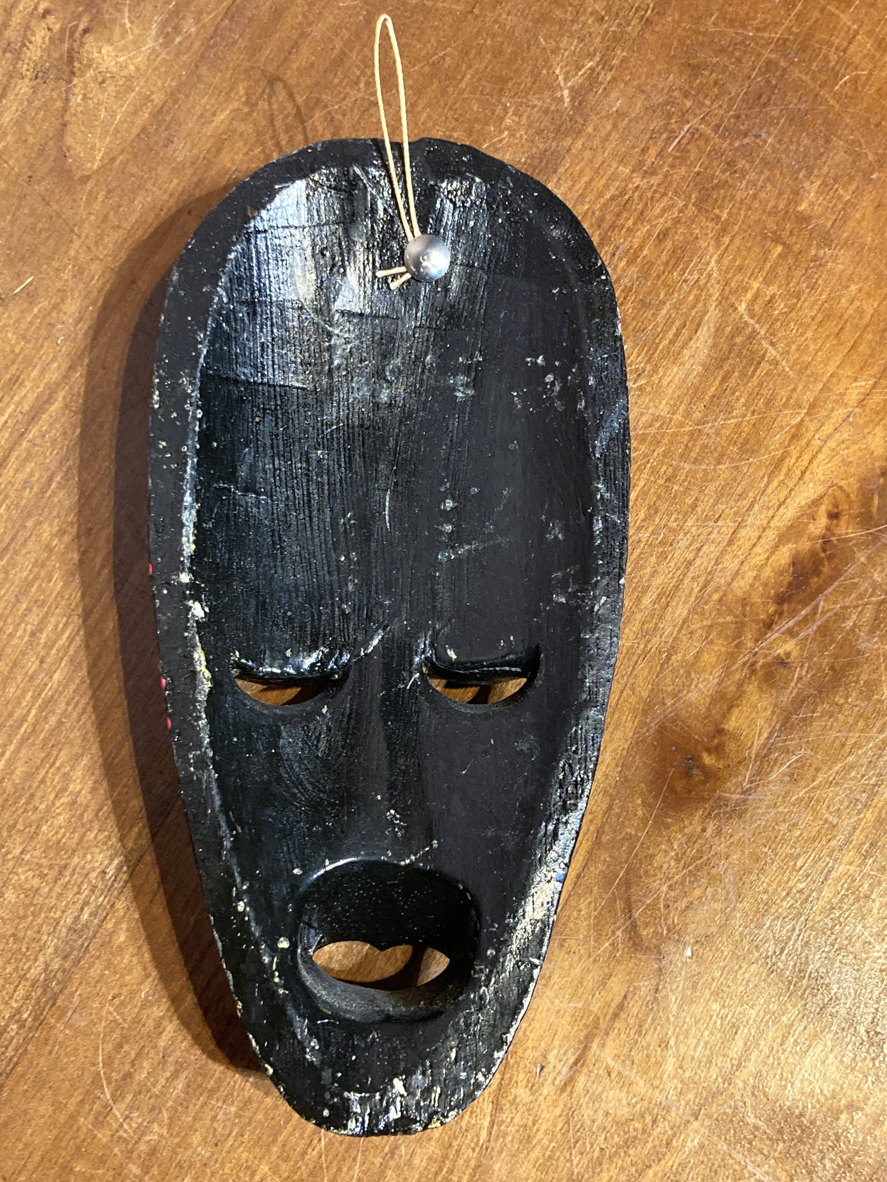 Wooden wall mask