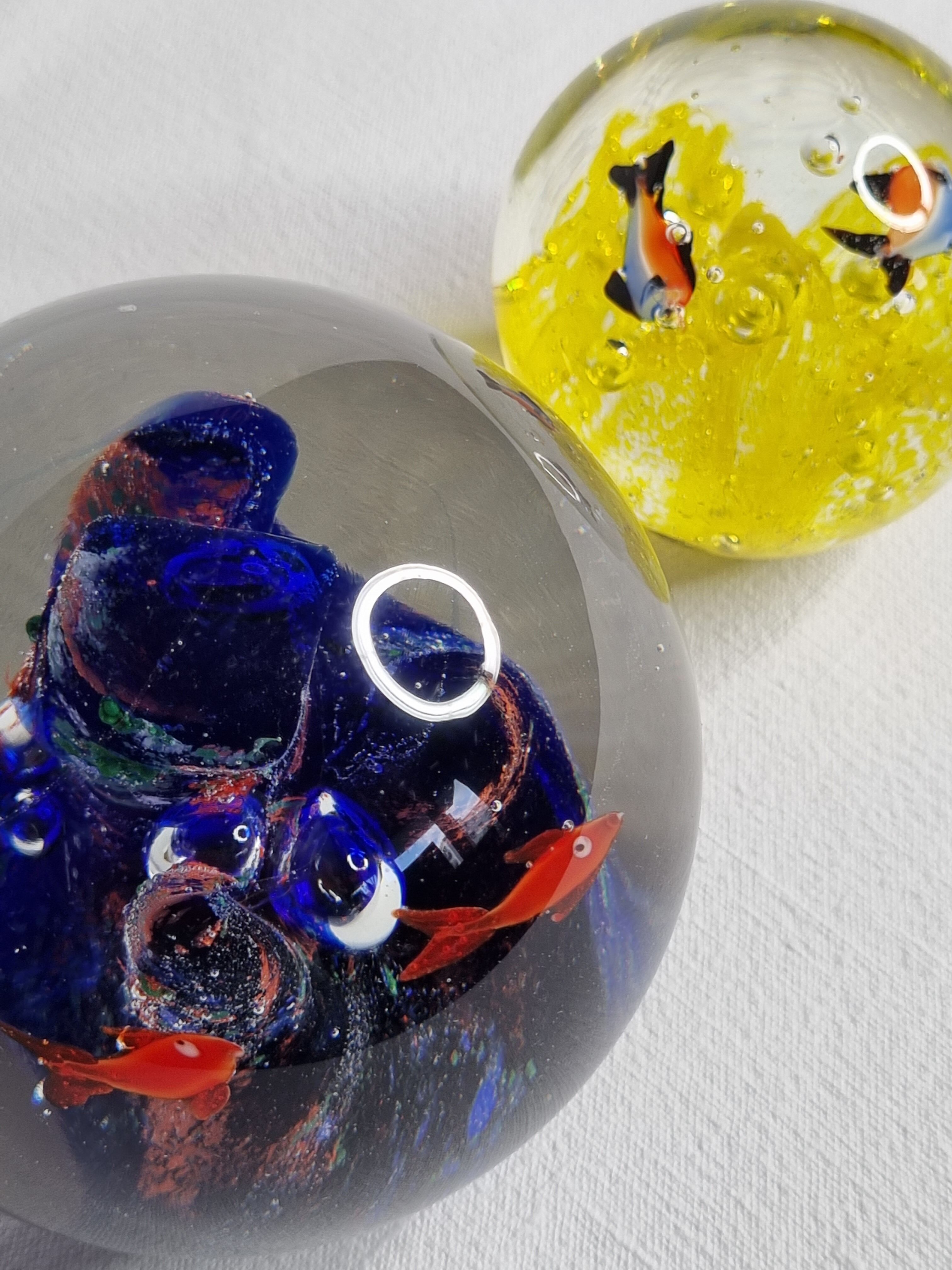Set of two sulphides, glass paperweight with fish decorations