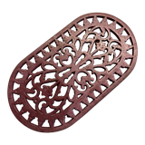 Old cast iron table mat