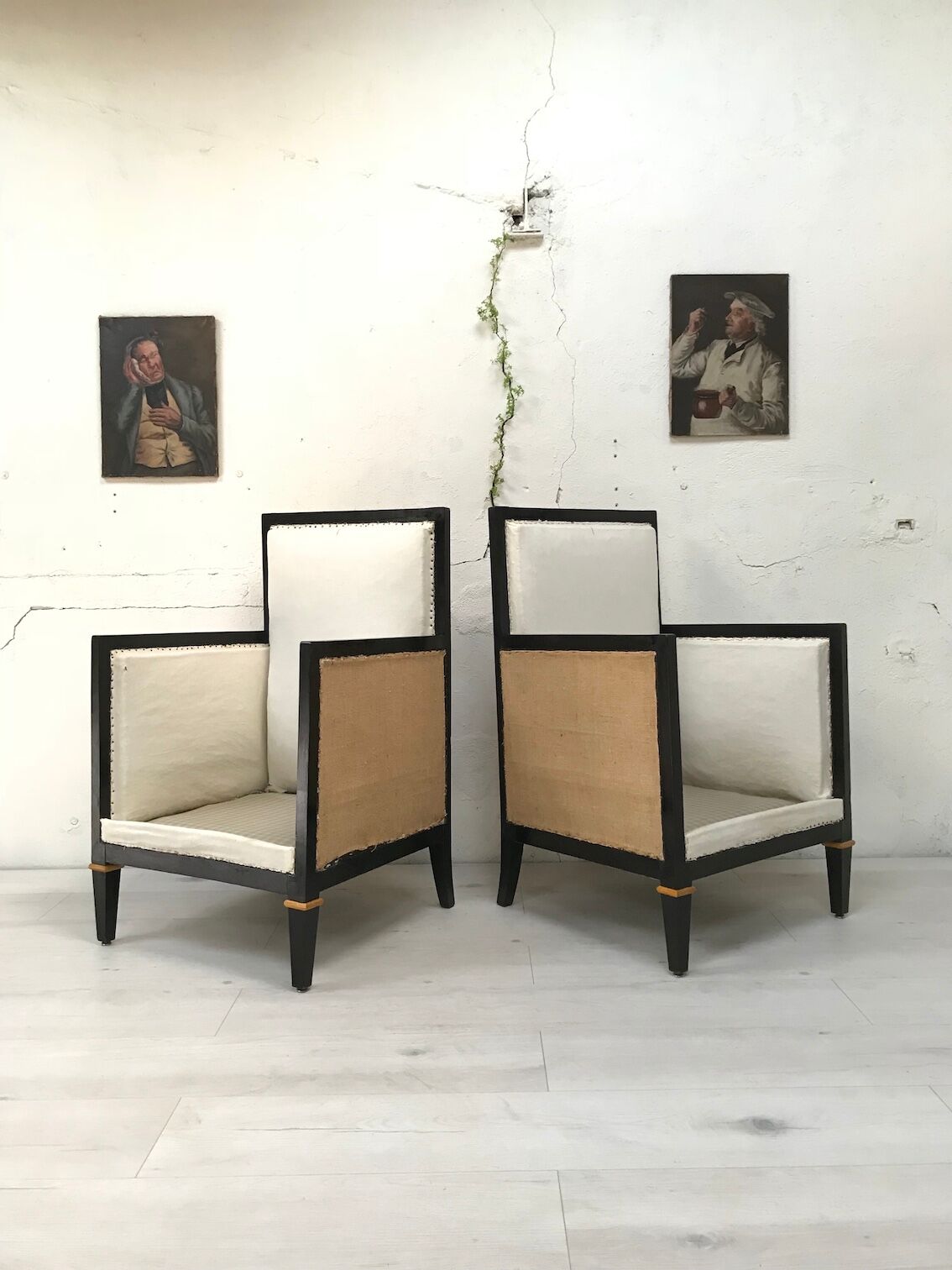 Pair of blackened wooden armchairs