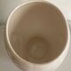 Vintage white ceramic face-shaped vase or planter