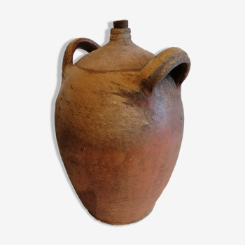 Old jar, glazed sandstone jug. Early twentieth century.