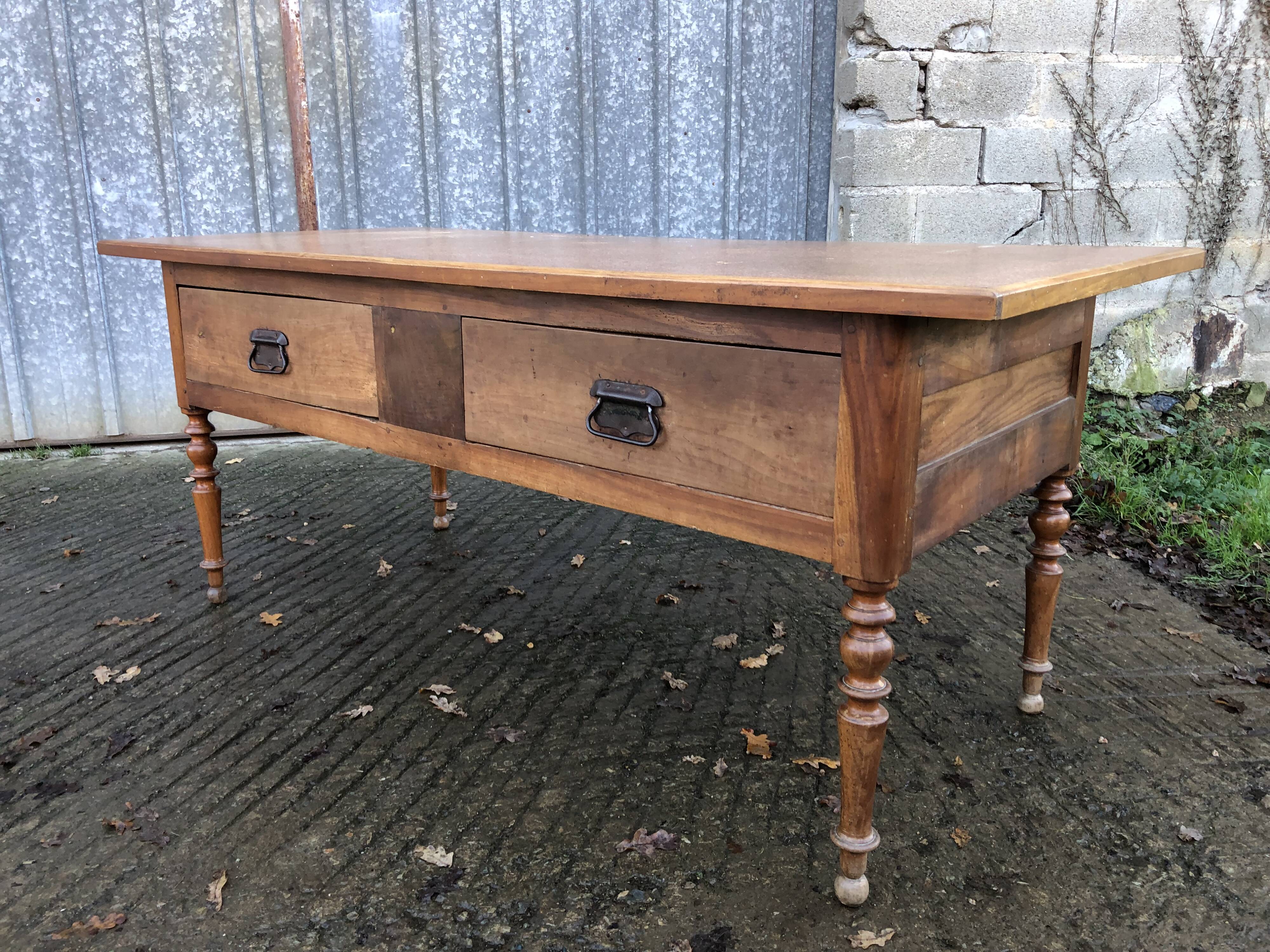 Solid cherry game table with 2 front drawers and panelled crosspieces.