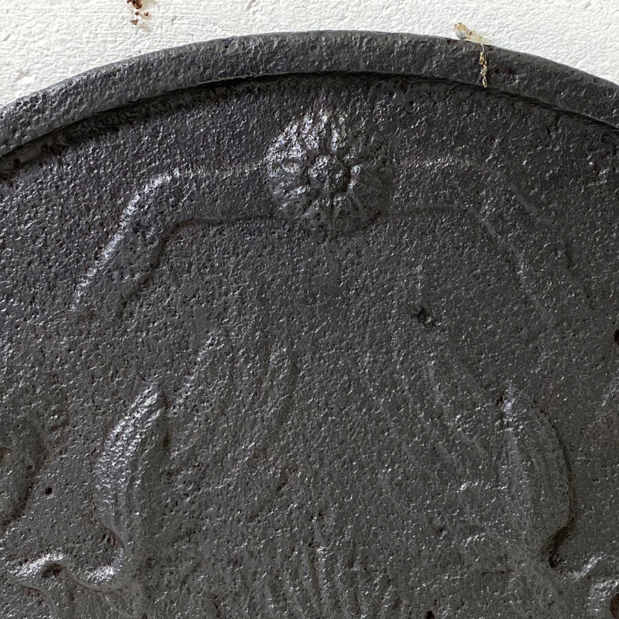 Plaque de cheminée en fonte