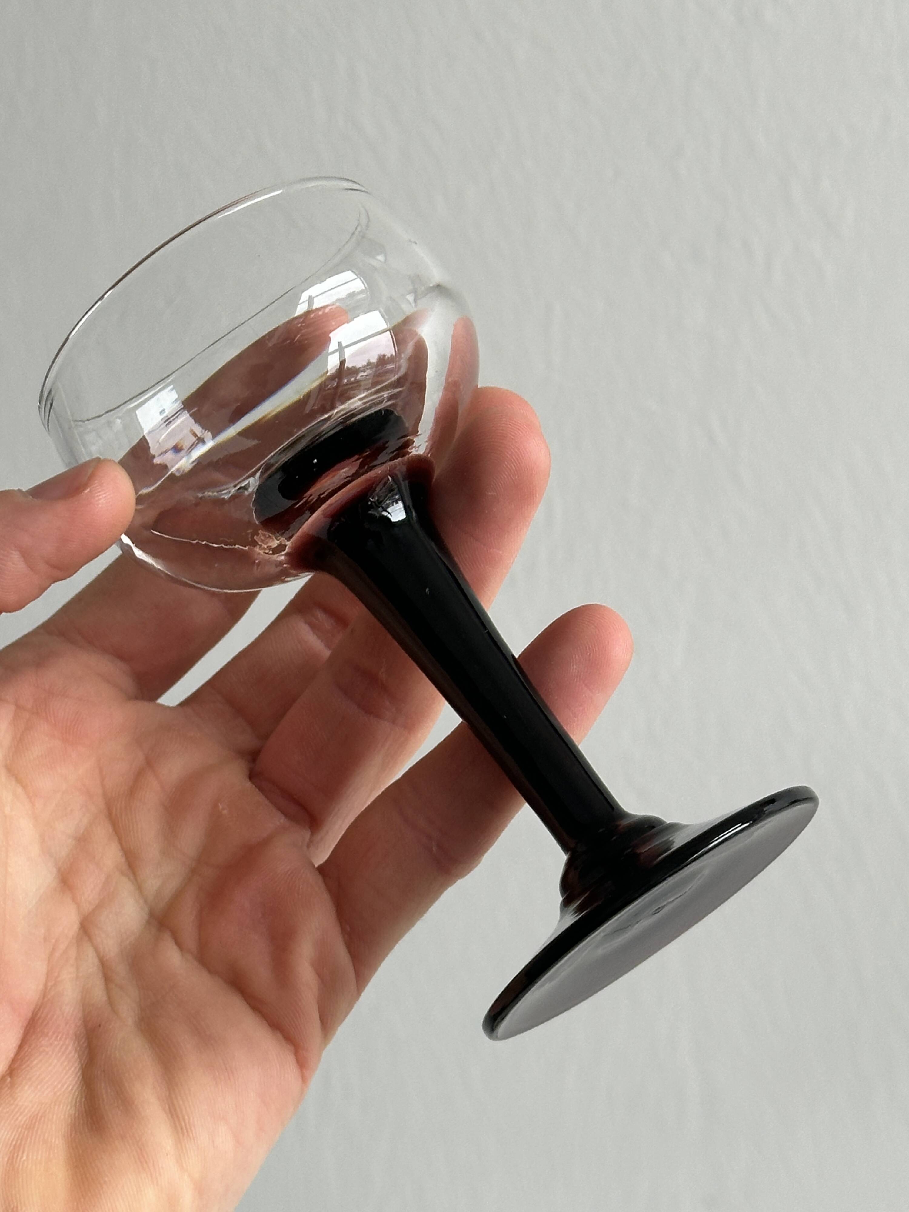 10 black stemmed liqueur glasses