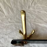 Vintage coat rack in lacquered metal with three golden aluminum hooks
