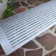 Perforated metal bench