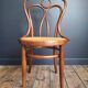 Antique Hoffman caned bistro chair, Art Deco and stool