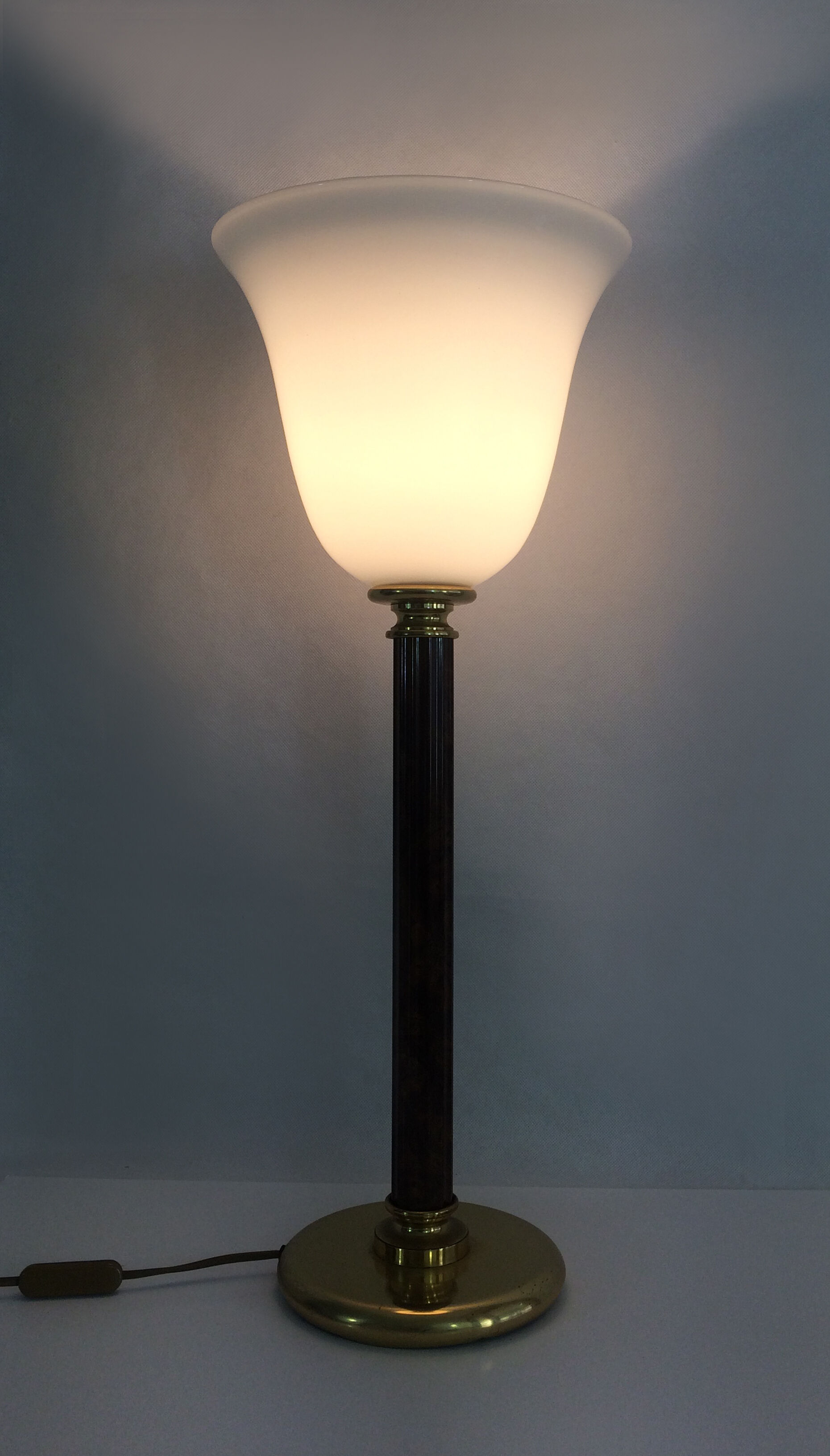 Mazda lamp in gilded metal, foot imitation wood and white opaline. Year 60
