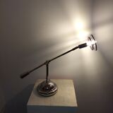 Articulated chromed metal lamp