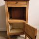 Wooden bedside table in Art Deco style