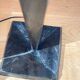 Pair of hammered black metal floor lamps with white shades.