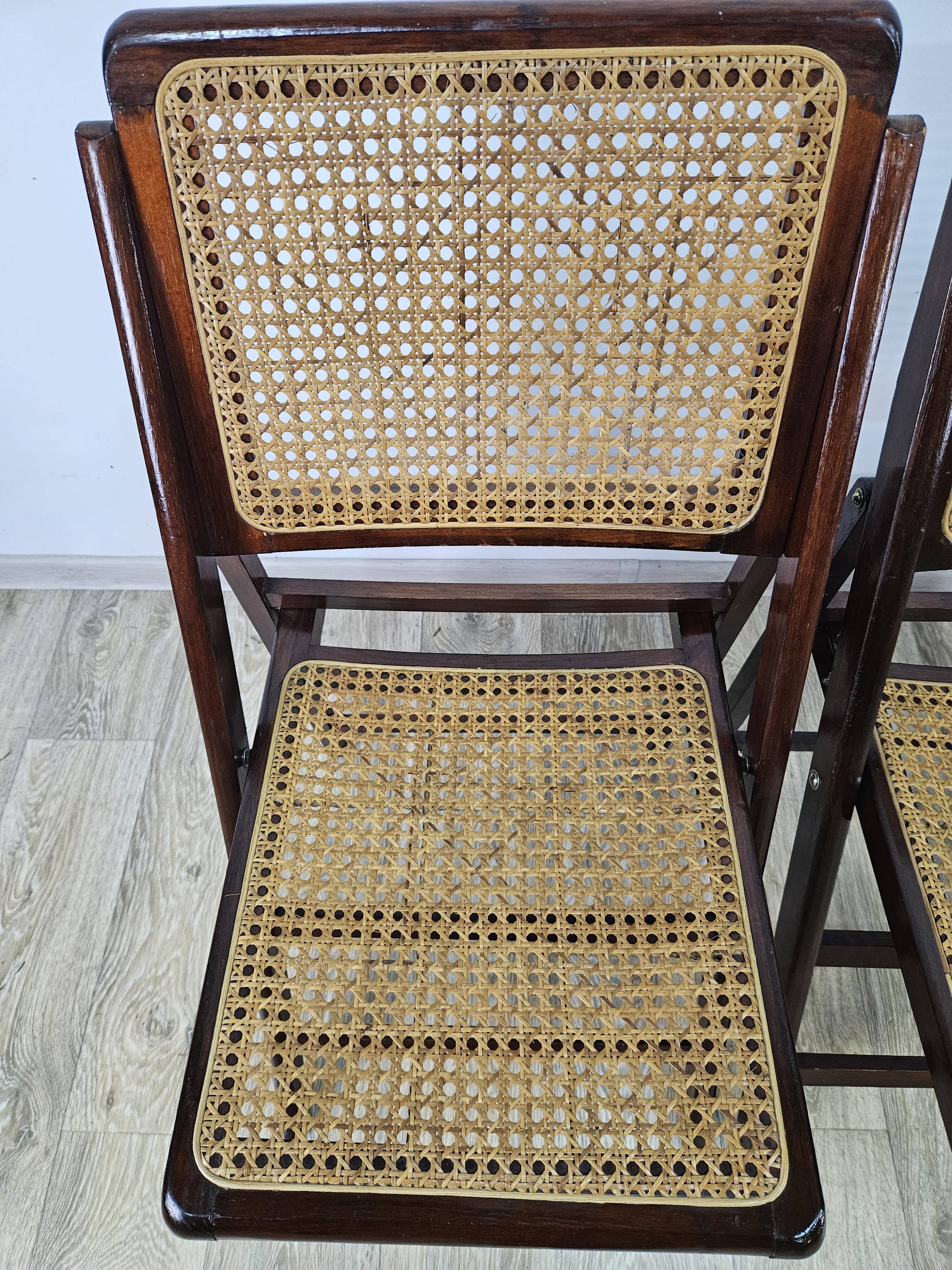 Folding wooden chairs with raffia, 1970s.