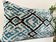 Coussin Ikat en velours bleu et noir