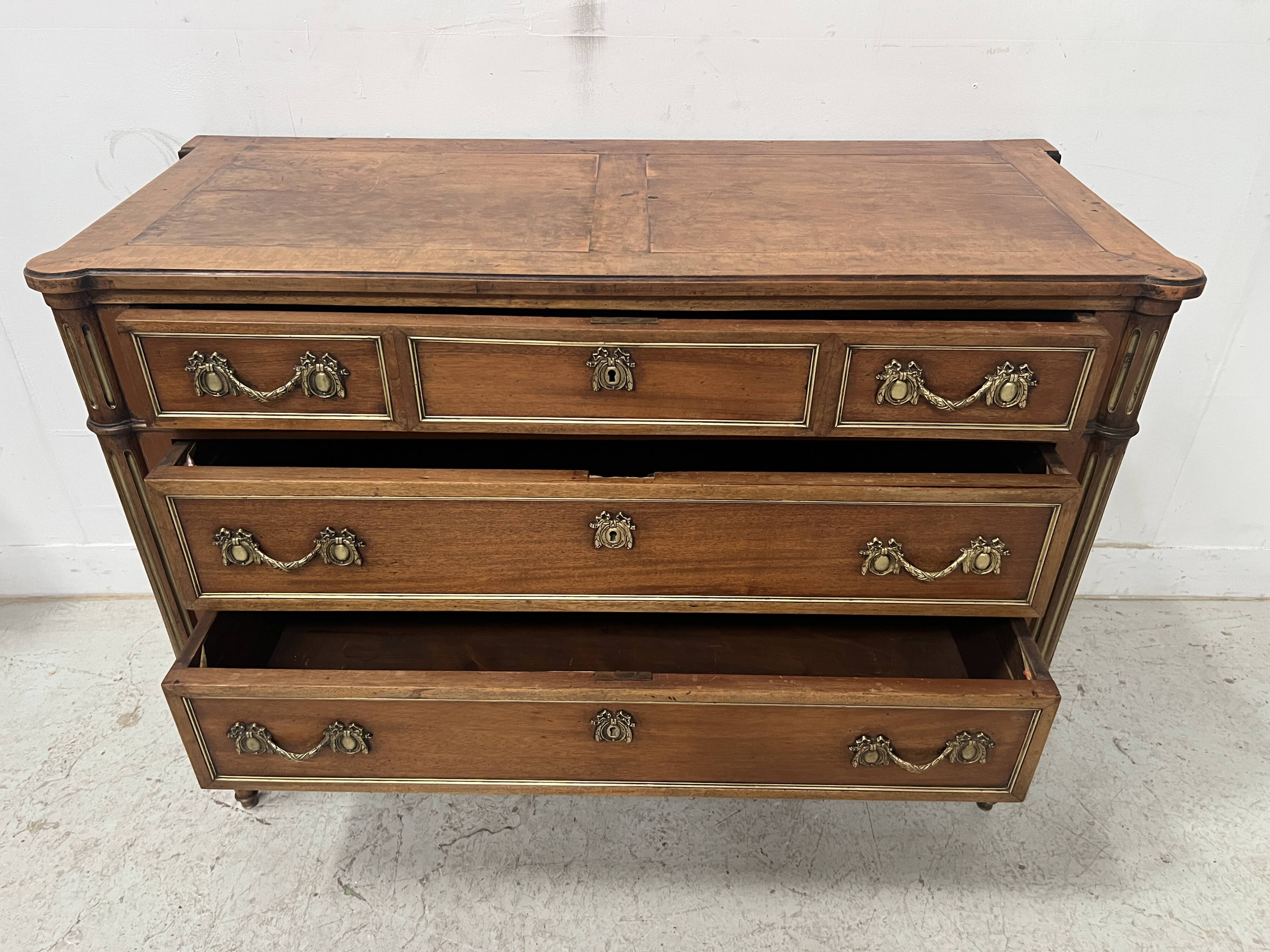 Louis XVI style mahogany commode with a grey veined marble top, 19th century