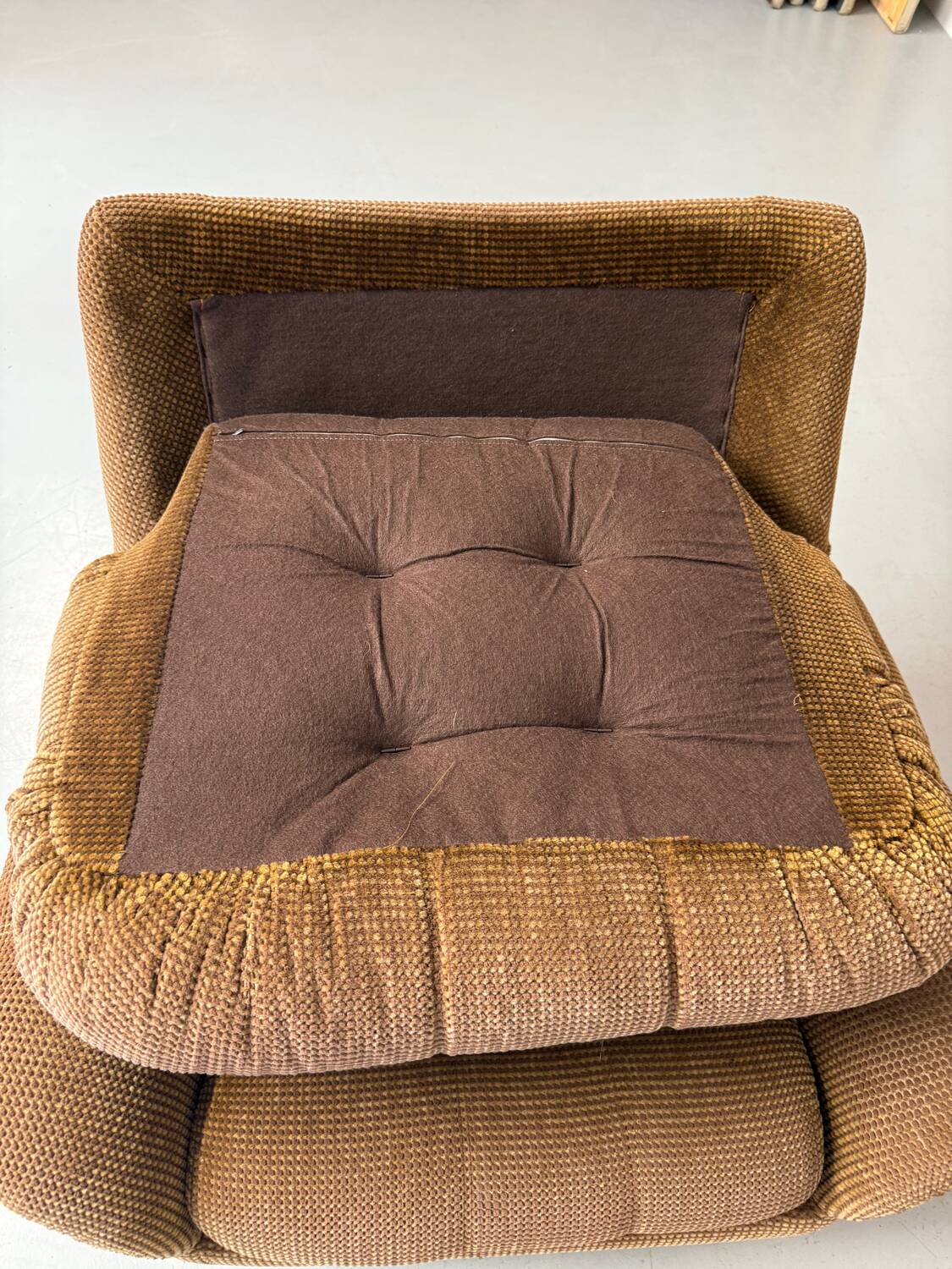 Old vintage 60s fabric lounge chair