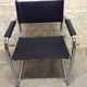 Chair leatherette and brass