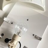 Polished and screen-printed glass sconce by eglo