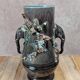 Antique vase in slipware with elephant and flower decoration.