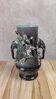 Antique vase in slipware with elephant and flower decoration.