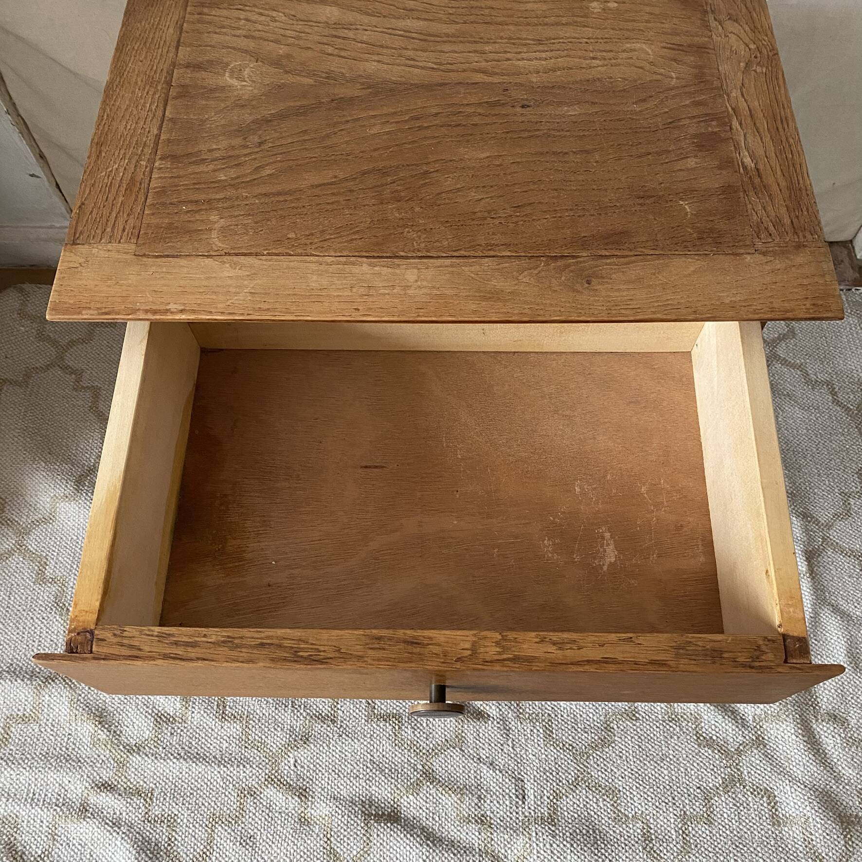 Scandinavian style bedside table with tapered legs from the 1960s.