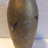 Soliflower with golden butterflies