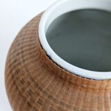 Pair of vintage Chinese vases in porcelain and woven bamboo.