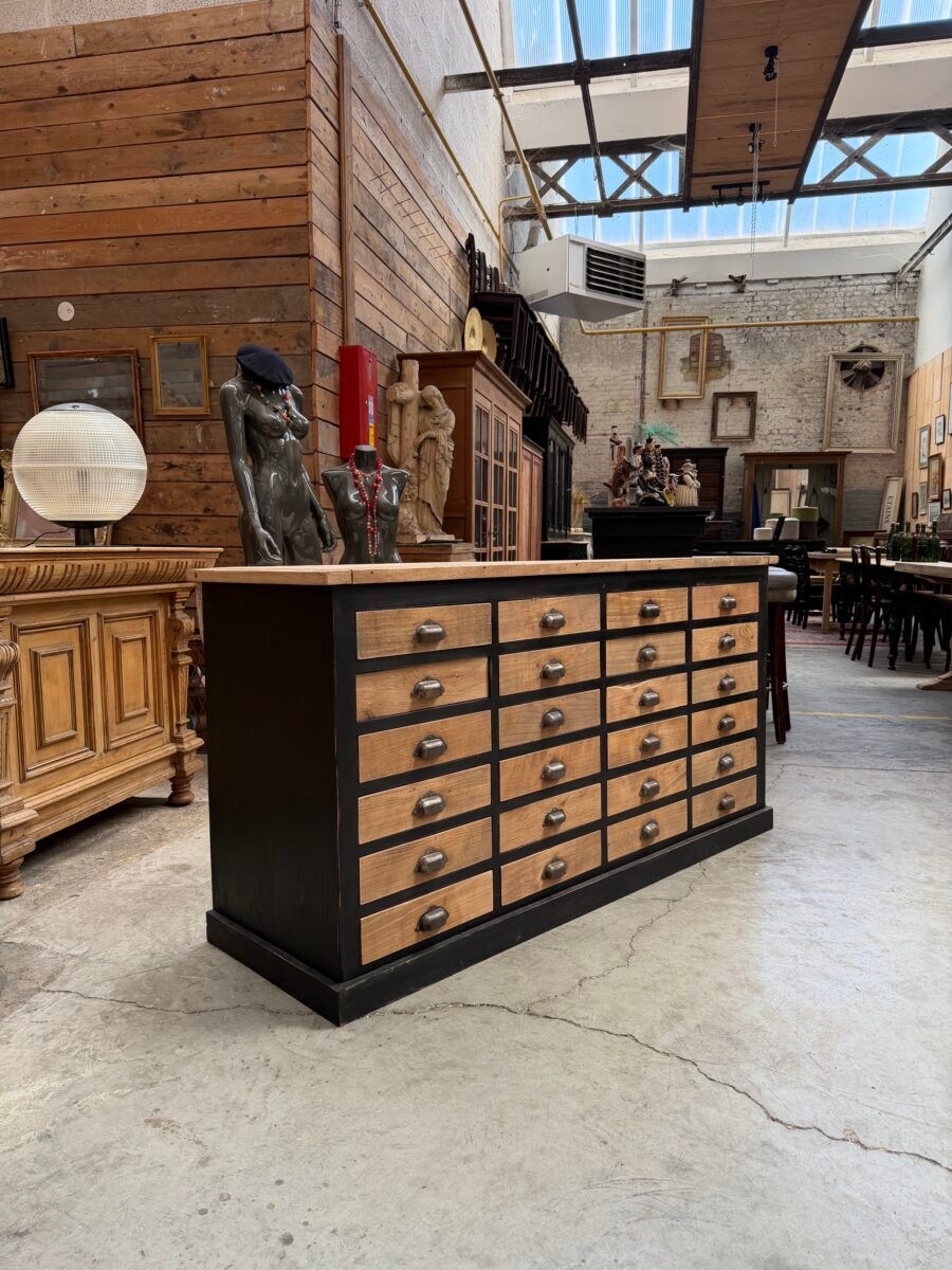 Workshop furniture with 24 drawers from the early 20th century.