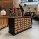 Workshop furniture with 24 drawers from the early 20th century.