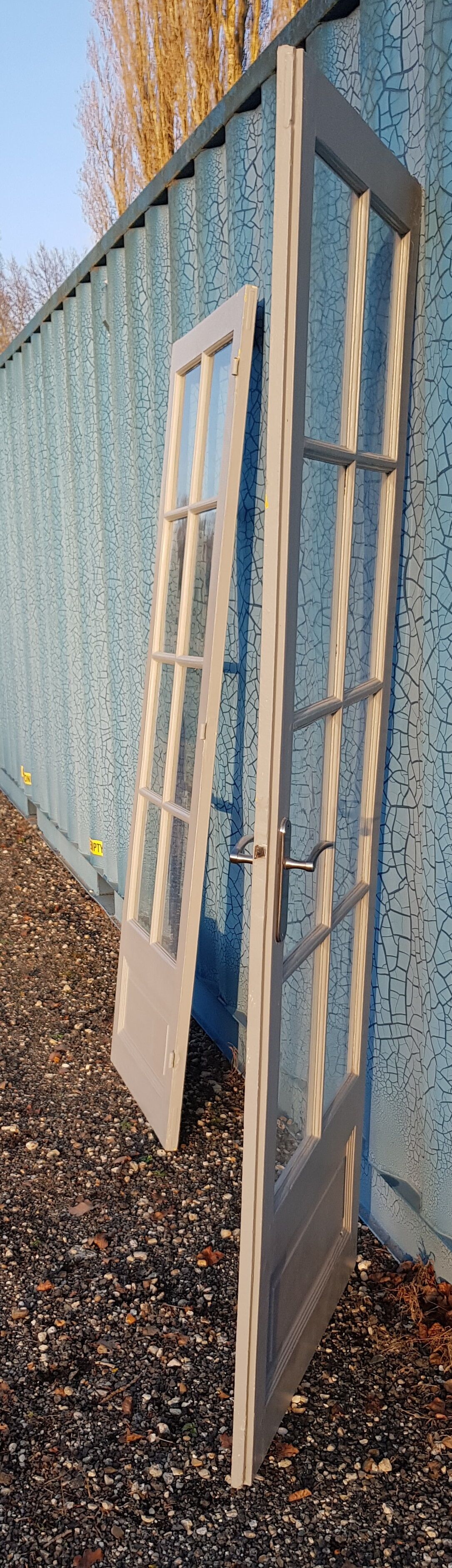 Lot of a double oak glass door