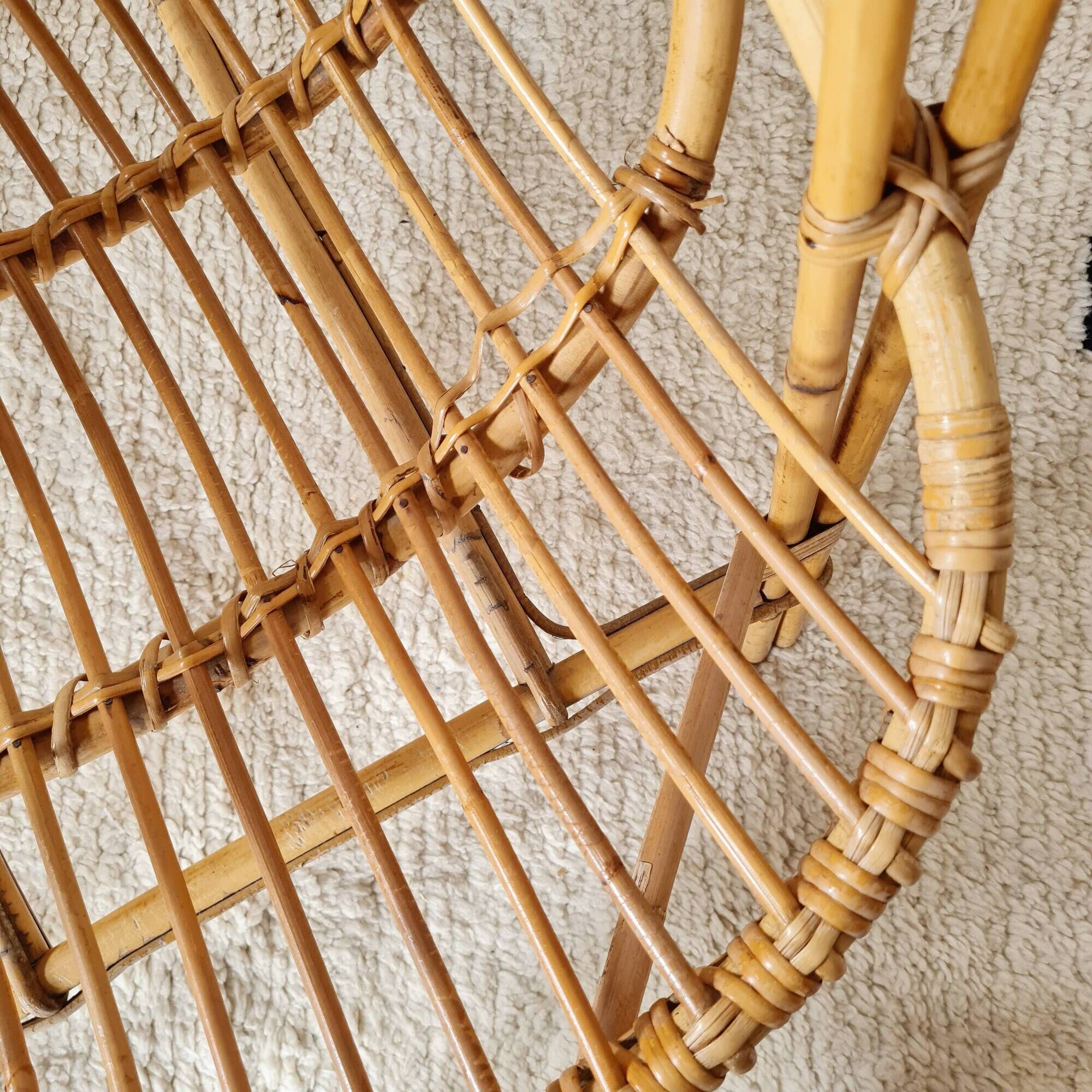 Vintage adult rattan armchair from the 1960s.