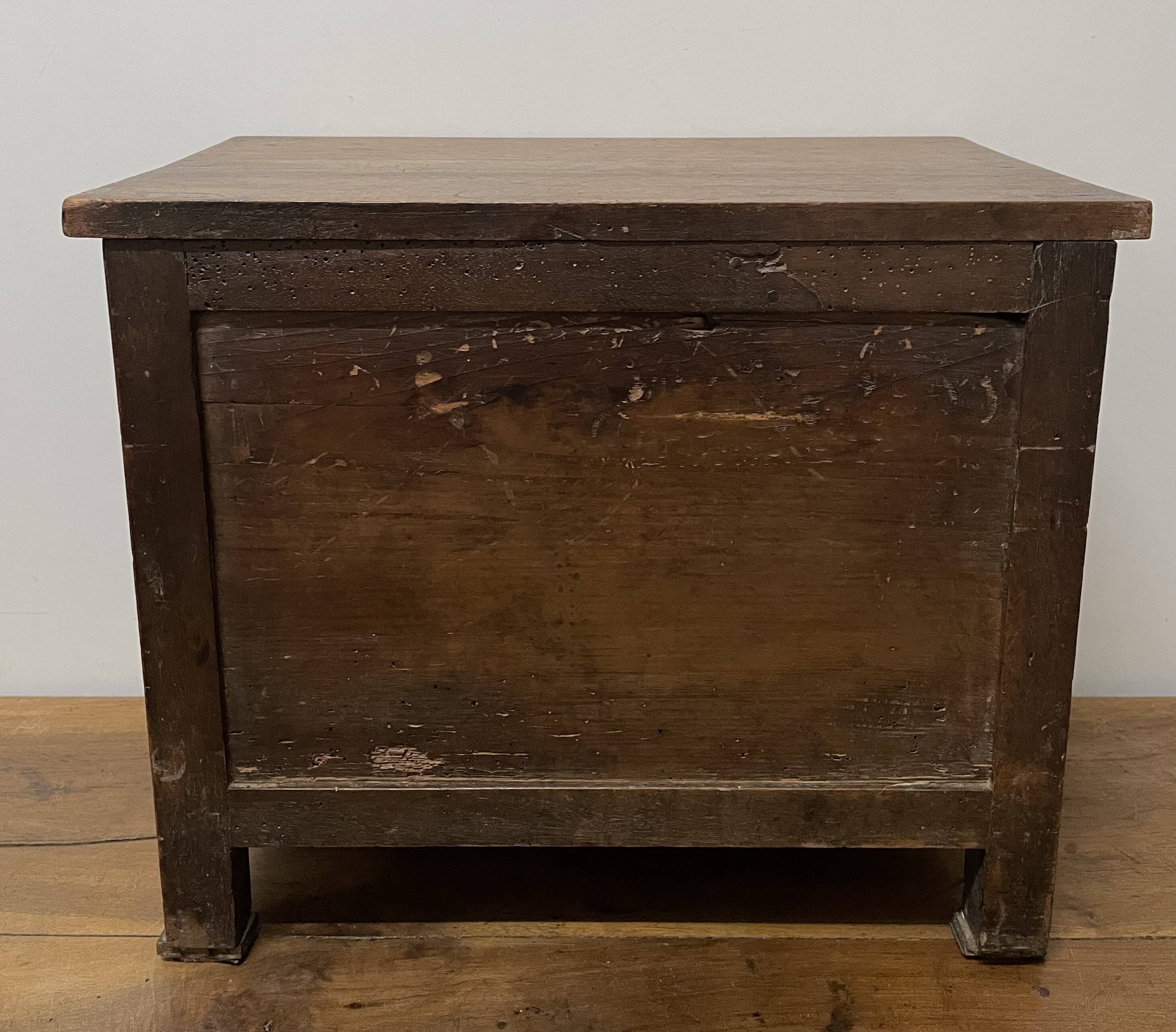 19th century Empire style walnut chest of drawers. It opens with 3 drawers in